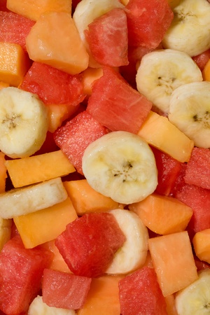 Fresh mixed fruit salad with banana, papaya,watermelonの写真素材