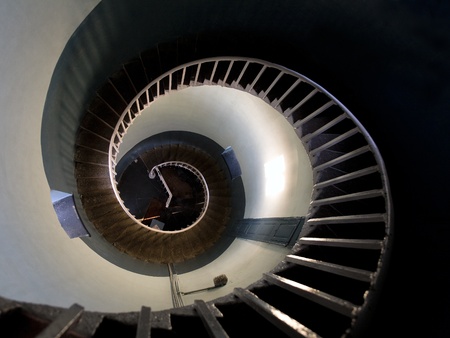 Upside view into the spiral of a lighthouse in Mamalipuram, Indiaの写真素材