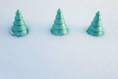 Christmas green tree from wood on    background  with  snow. Christmas and New year decorations or greeting card.の写真素材