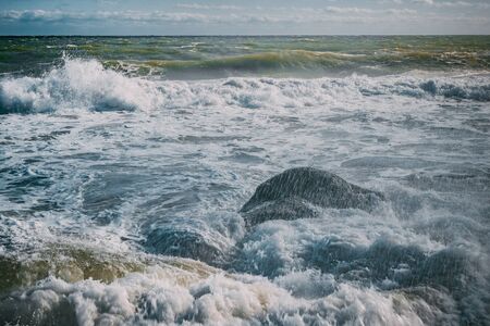 waves on the sea beach on a sunny day