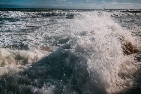 waves on the sea beach on a sunny day
