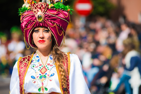 Badajoz, Spain - february 15, 2015:Performers take part in the Carnival parade of comparsas at Badajoz City. This is one of the best carnivals in Spain, renown by all the national news media and especially highlighting massive participation of people.のeditorial素材