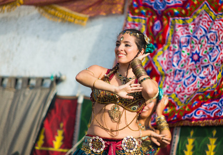 Marvao, Portugal - October 1, 2016: Bellydancer in the celebration of Al mossassa in the town of Marvao, Portalegre, Alentejo Region, Portugalのeditorial素材