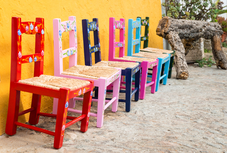 Aged colored ornamental wooden chairの写真素材