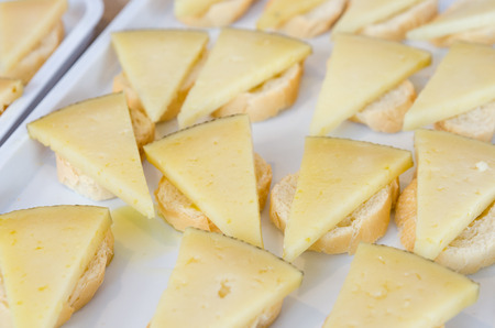 closeup of some slices of sheep cheeses from Badajoz, Extremadura, Spain