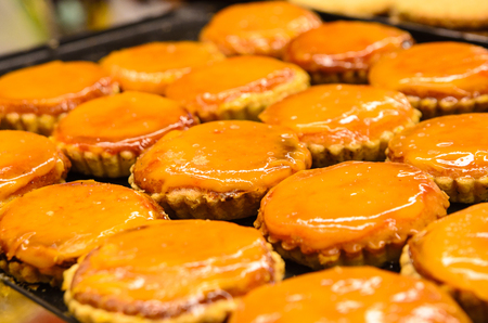 delicious egg tart on tray, spanish typical sweetsの写真素材