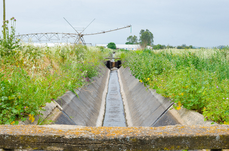 Irrigation water channel. Rural landscape in Extremadura, spainの写真素材