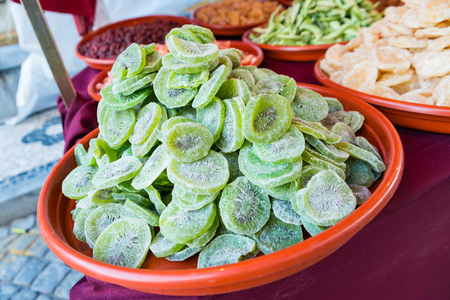 Dried slices of kiwi fruit on a marketの写真素材