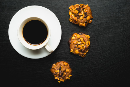 artisan chocolate and almond cookies with coffee. Top viewの写真素材