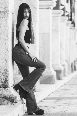 Black and white portrait of beautiful woman on the streetの写真素材