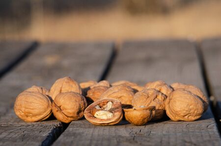 Delicious walnuts on wood table with copy space for text