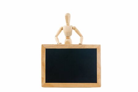 Wooden mannequin and chalkboard isolated on whiteの写真素材