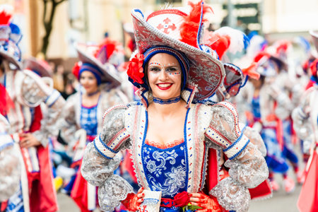 Badajoz, Spain, sunday. February 19 2023. Parade through the streets of Badajoz, group called Los lorolosのeditorial素材