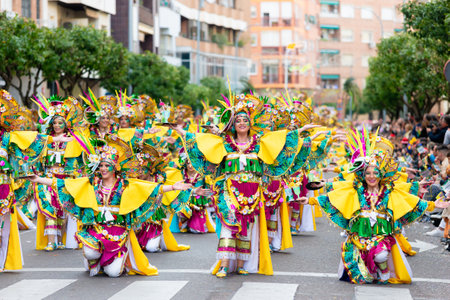 Badajoz, Spain, sunday. February 19 2023. Parade through the streets of Badajoz, group called los tukanesのeditorial素材