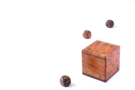 Wooden dice, one of them big.Random conceptの写真素材