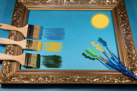 The sun is painted on a blue background in a gilded frame. Nearby are thin and wide brushes with...