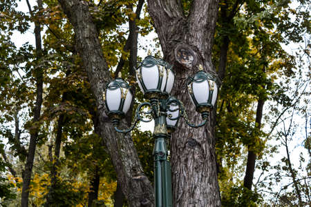 Urban street lighting. Street lamps in the old style.