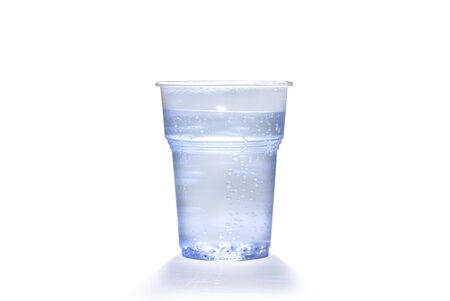 Plastic cup with water  bubblesの写真素材