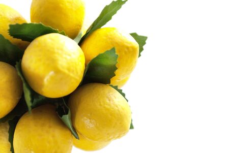 Plastic fake fruit lemon, isolatedの写真素材