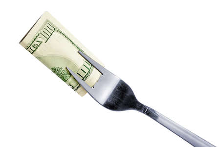 $ 100 bill on a fork, isolated on white.の写真素材