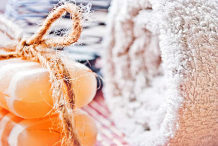 Set for SPA services, ready to use, candle, towel and soap. Fragment. Soft focus.の写真素材