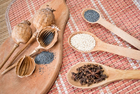 Penetrated head poppy, poppy seeds and other seeds and spices.の写真素材