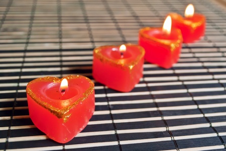 Red candles in the shape of the heart. Still Life.の写真素材