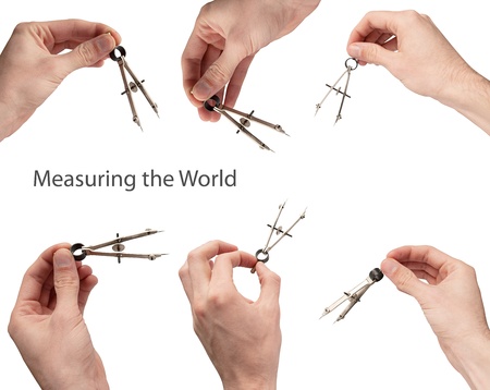 The compasses in hand set, isolated on white.