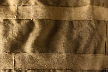 Rough texture of military bag with two fabric stripes.の写真素材