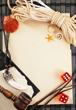 Marine theme frame of some sailor items on a wooden mat.の写真素材