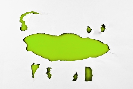 Paper-hole monster with green background.の写真素材