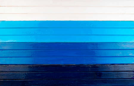 Blue and white  painted wooden planks background.
