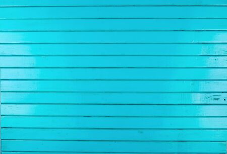 Blue painted wooden planks background.
