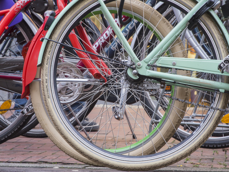 Aurich, Germany - December 28, 2015: shallow angled view of in a row of bicycles in Aurich / East Frisiaのeditorial素材
