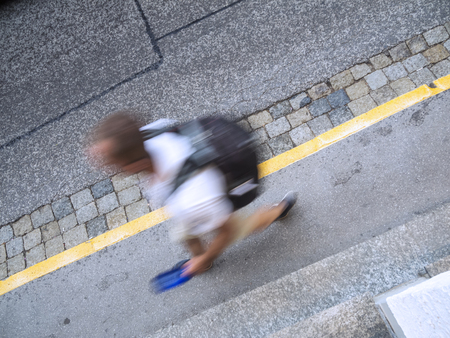 hurrying backpack touristの写真素材