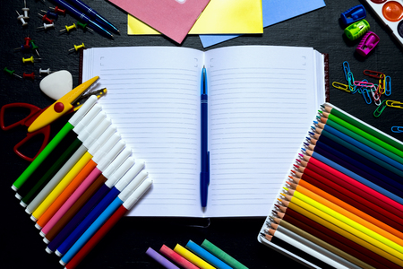 School supplies on a black background. Top viewの写真素材