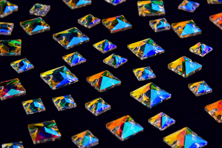 Precious stones crystals in the shape a square on a black backgroundの写真素材