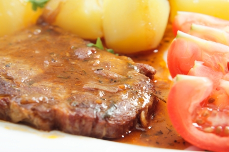 Roasted shoulder with sauceの写真素材