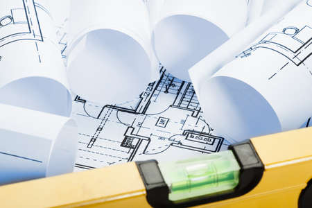 Spirit level and architecture blueprints, Blue toneの写真素材