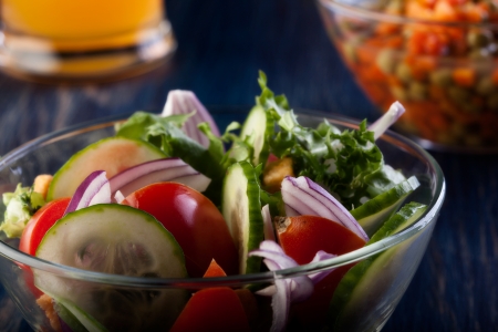 Closeup of salad  Lettuce, tomato, and cucumber  Dark toneの写真素材