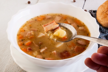 Pea soup on white tableの写真素材