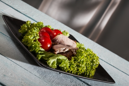 Raw vegetables and sliced roast  Dark toneの写真素材