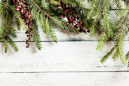Christmas tree with decoration on a wooden boardChristmas tree on a wooden board