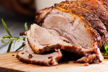 Roasted shoulder on a cutting boardの写真素材