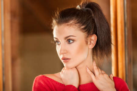 Portrait of beautiful young girl at indoorsの写真素材