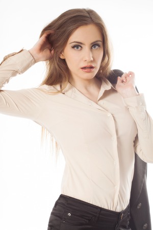 Young business woman portrait on white background.の写真素材