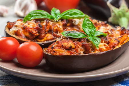 Baked eggplant with pieces of chicken in tomato sauceの写真素材