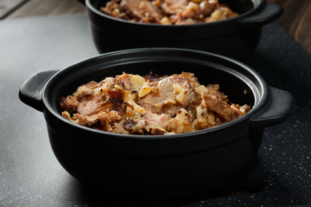 Potatoes baked with sausage and bacon. mystical lightの写真素材