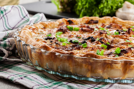 Savory tart with chicken, mushrooms and cheeseの写真素材