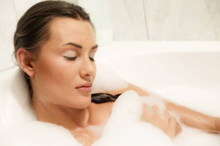 Beautiful women relaxing in her bath